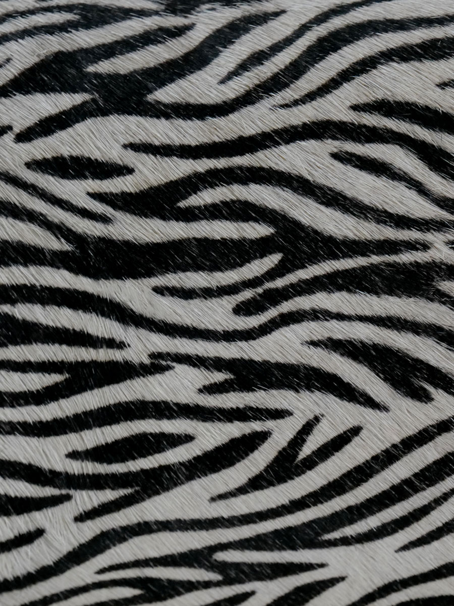 leather-pouch-for-woman-zebra-matter-texture-adele-safari-paul-marius-