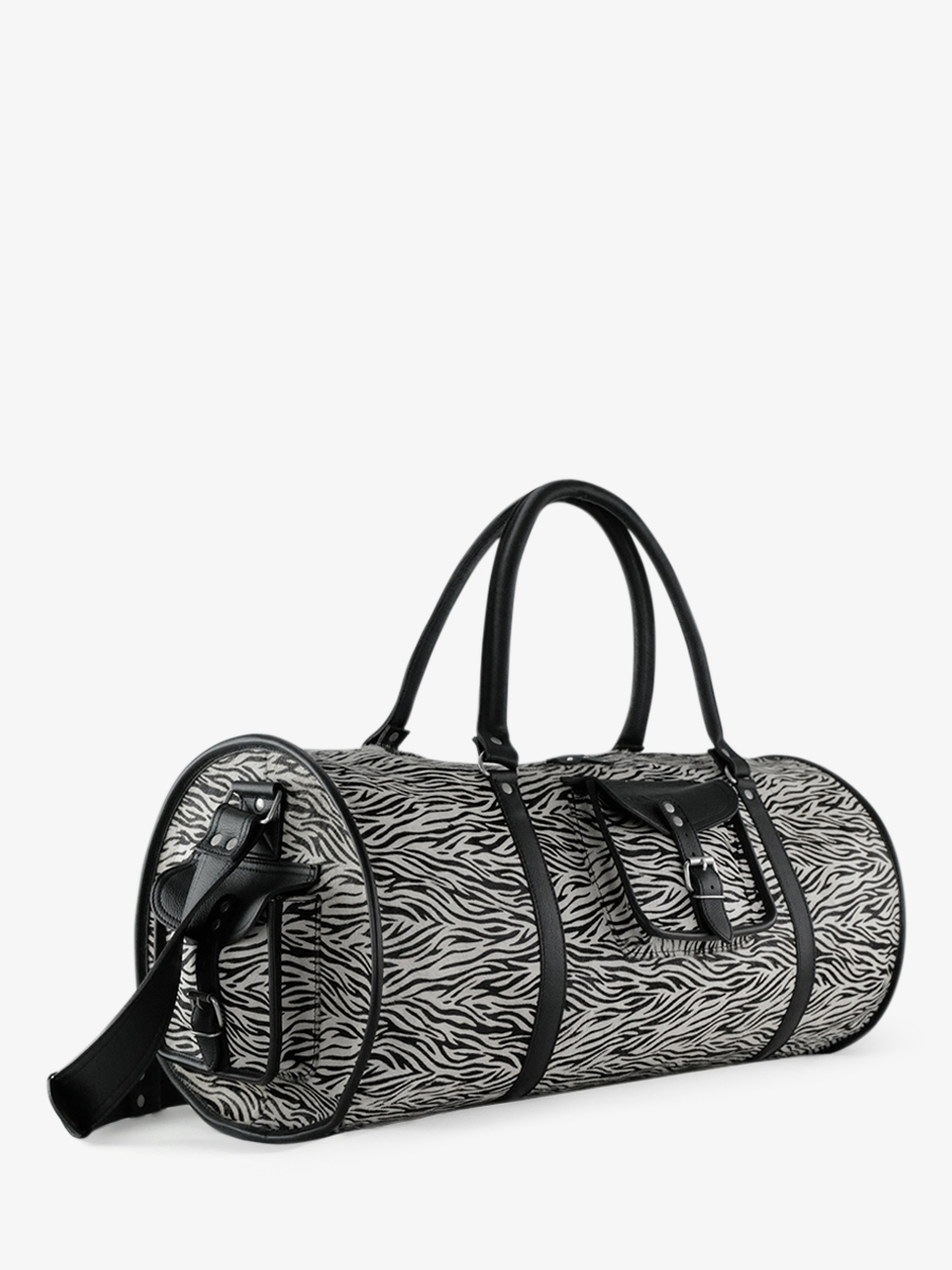 leather-travel-bag-for-woman-zebra-side-view-picture-levoyageur-xl-safari-paul-marius-