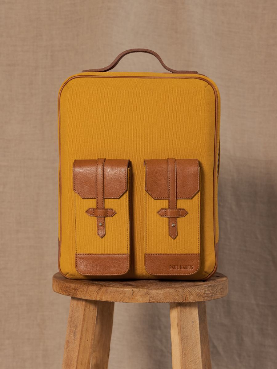 leather-backpack-unisex-brown-yellow-side-view-picture-urbain-light-brown-saffron-canvas-paul-marius-b08-ol-yc